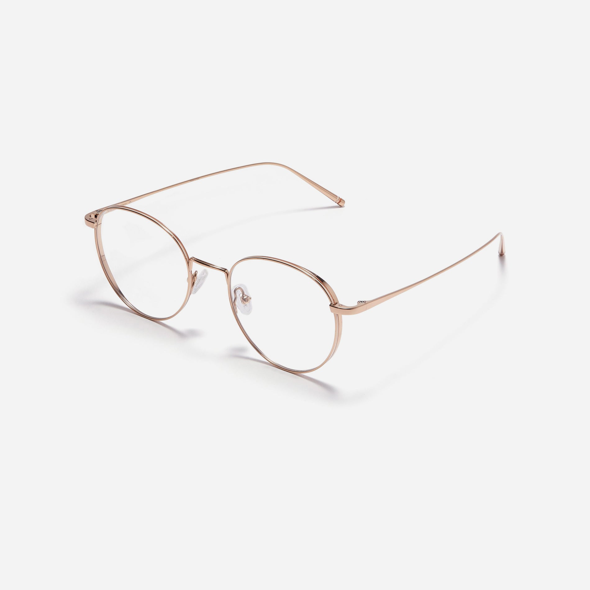 Round-shaped, full-metal eyeglasses with a dual-rim structure designed to accommodate thicker, high-prescription lenses. Both the frame and temples are made of pure titanium, ensuring a lightweight and comfortable fit.