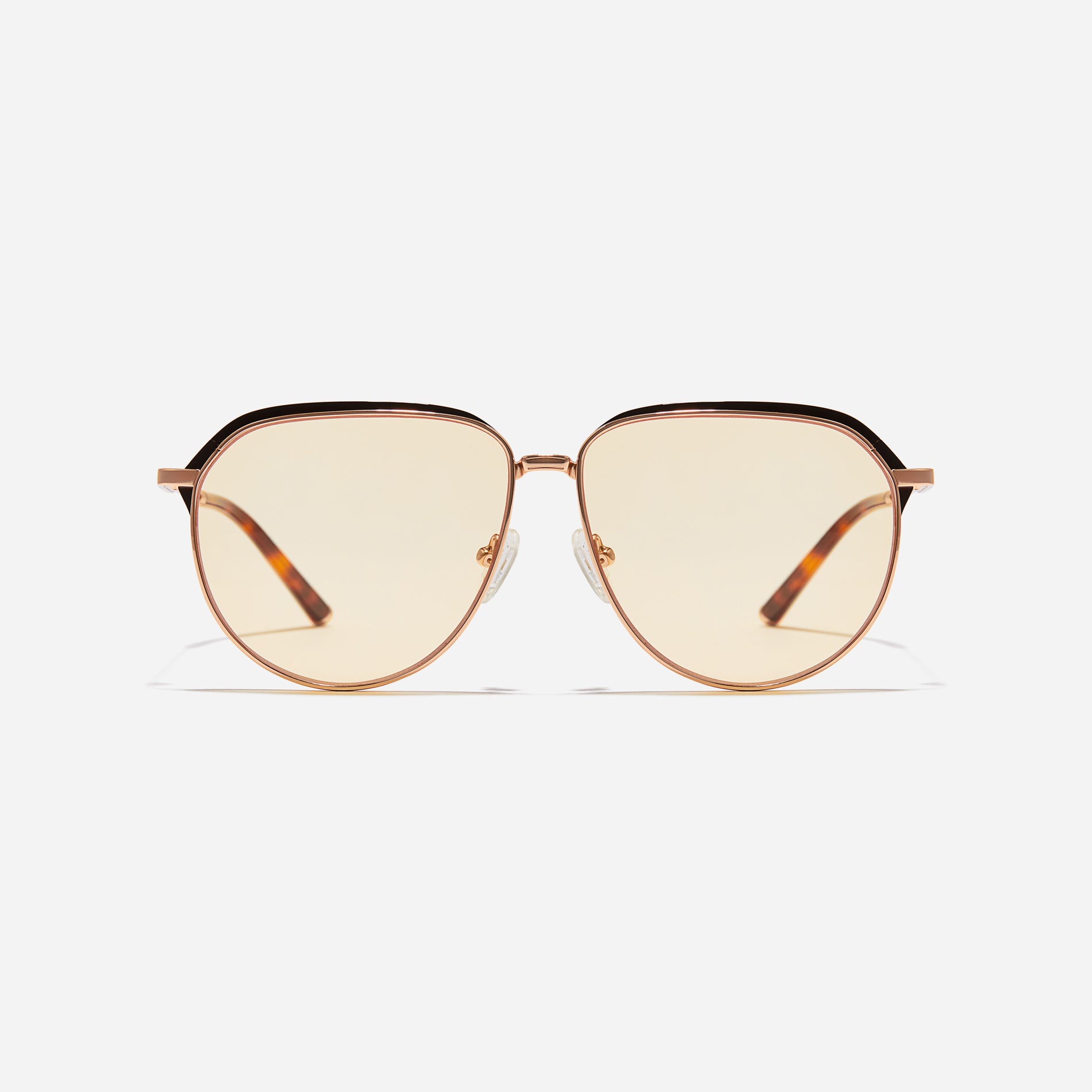 Oversized aviator sunglasses that embody a bold, free-spirited trend. Their sleek temples with subtle detailing elevate their chic and stylish vibe.