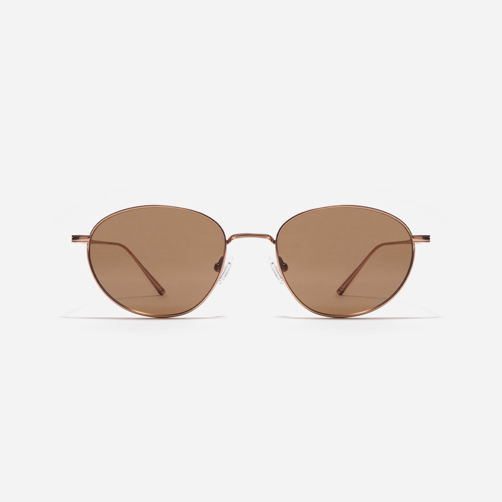 Idell sunglasses feature sleek metal frame with a narrow design. Crafted entirely from titanium, they guarantee a lightweight and comfortable fit. Available in color variations that naturally complement facial features, they provide a soft and versatile style for everyday wear.