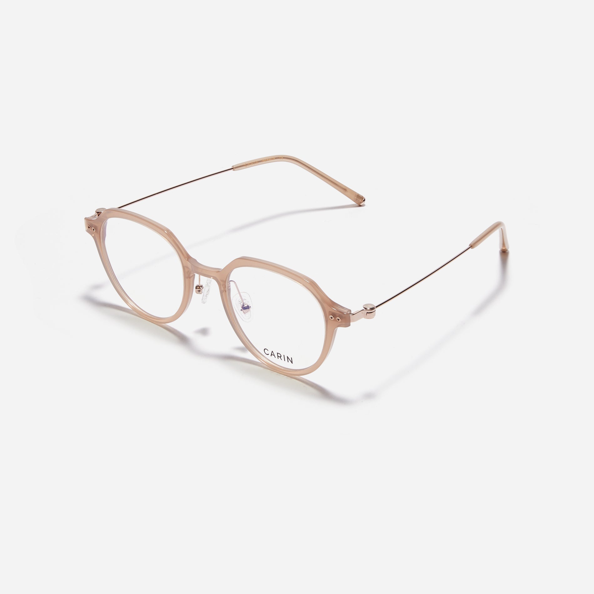 Polygonal-shaped eyeglasses crafted with a blend of G850 bio-plastic and stainless steel, ensuring resilience against breakage. Incorporated with CARIN's patented anti-loosening hinge technology, these eyeglasses ensure a consistently comfortable fit.
