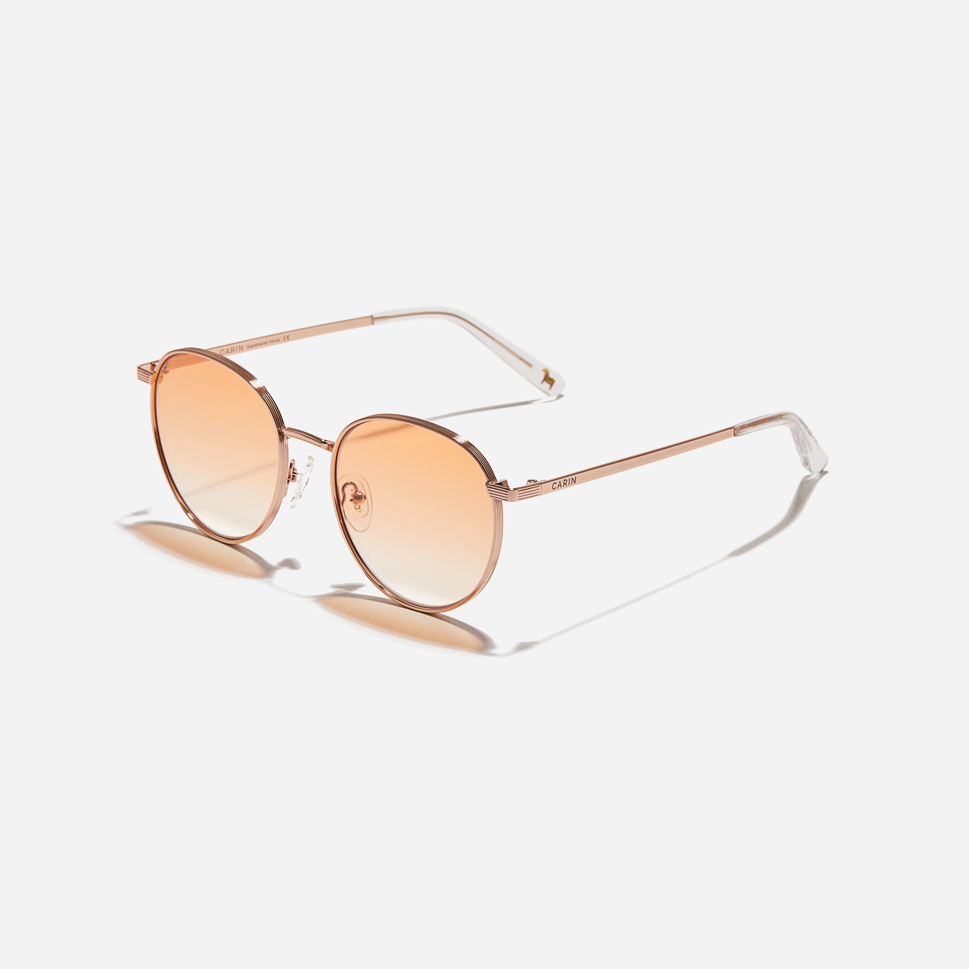 Boeing-style sunglasses featuring chic temple details and half-mirrored lens coating that reduces glare and provides 100% UV protection.