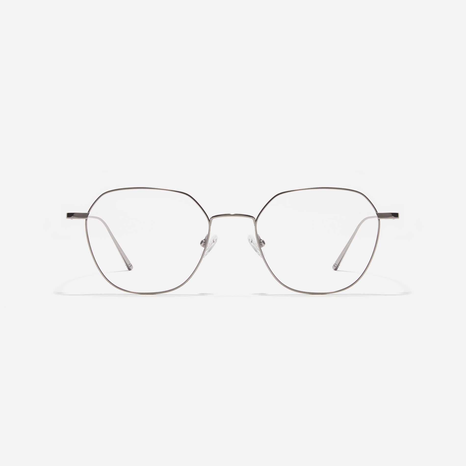 Norman glasses feature a polygonal shape with oversized rims. Crafted entirely from titanium, they are lightweight and comfortable to wear. Available in four different colors, these glasses offer fashionable styles suitable for both men and women.