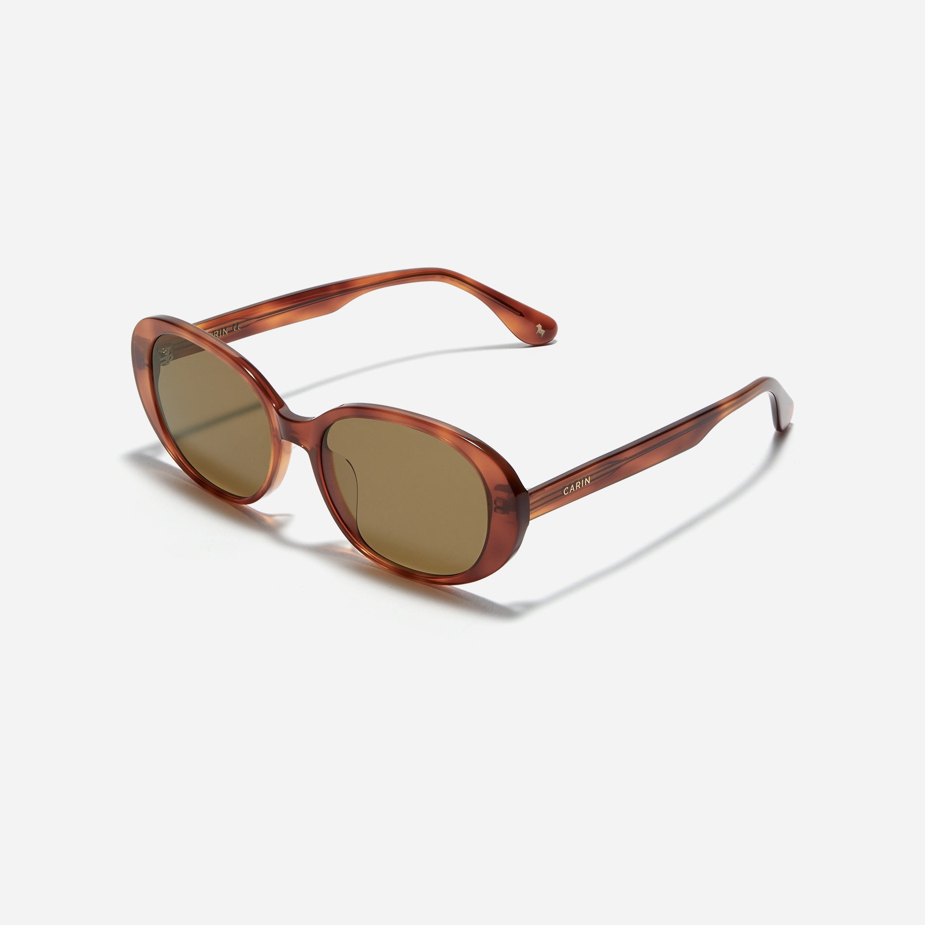 Oval-shaped petite frame sunglasses that feature a modern, unisex, and casual design that reinterprets retro sensibilities with a modern touch.