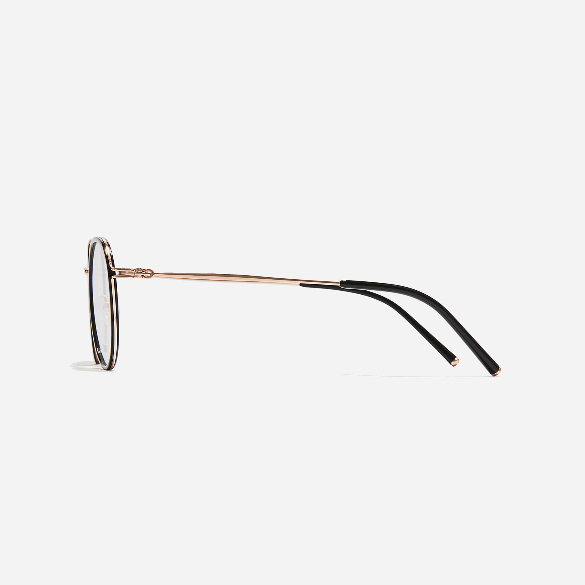 Polygonal-shaped eyeglasses that feature a contrasting round lens design, offering a smooth yet refined style.  They provide a comfortable wearing experience with slim temples made from lightweight and elastic B-Titanium material.