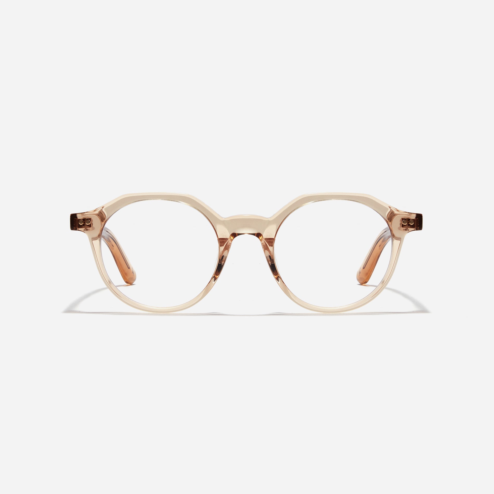 Polygon-shaped horn-rimmed eyeglasses. Embodying a modern reinterpretation of '90s retro vibes, their design is created for effortless styling. 