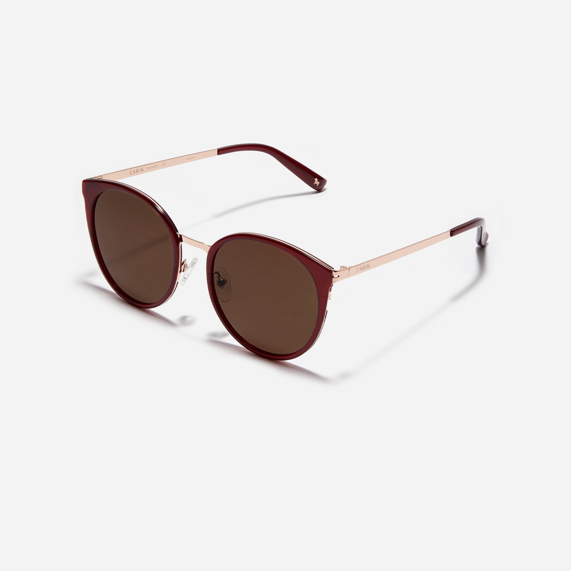 Round-shaped combination polarized sunglasses that feature delicate acetate rims and metal structural details.