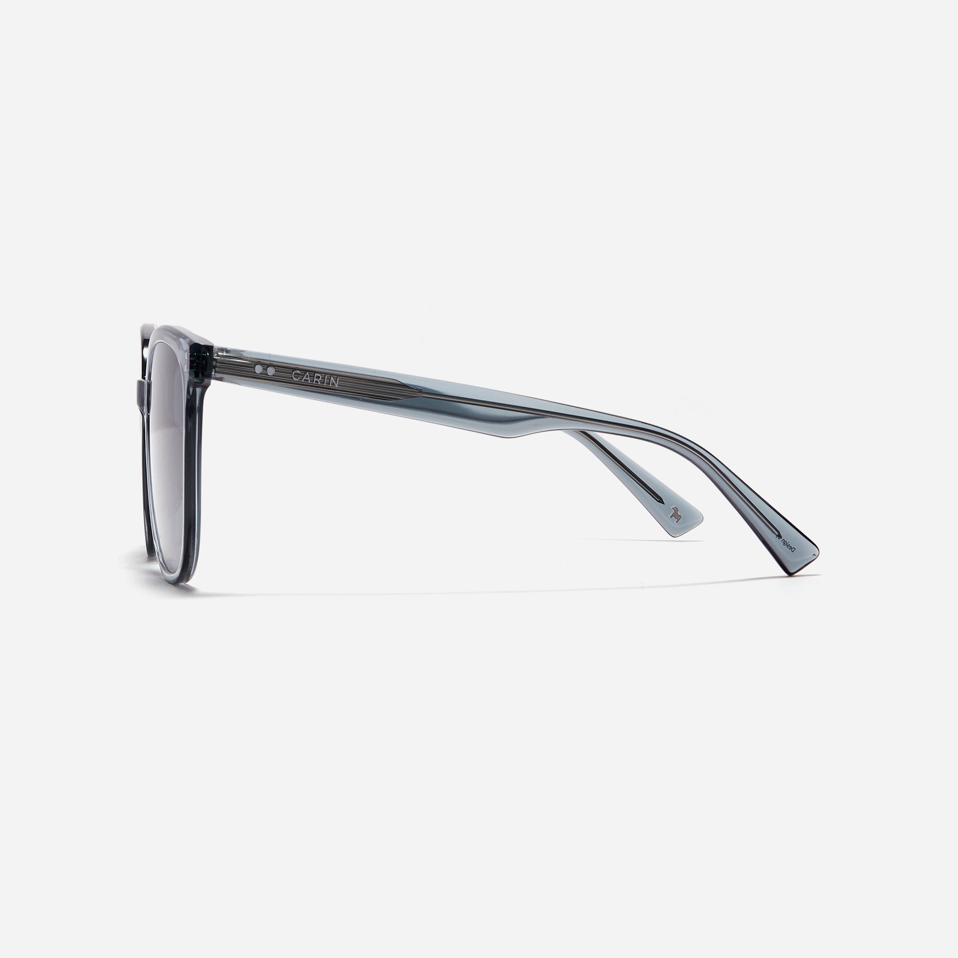 Square-shaped polarized sunglasses, crafted from compressed acetate material for enhanced lightweight properties.