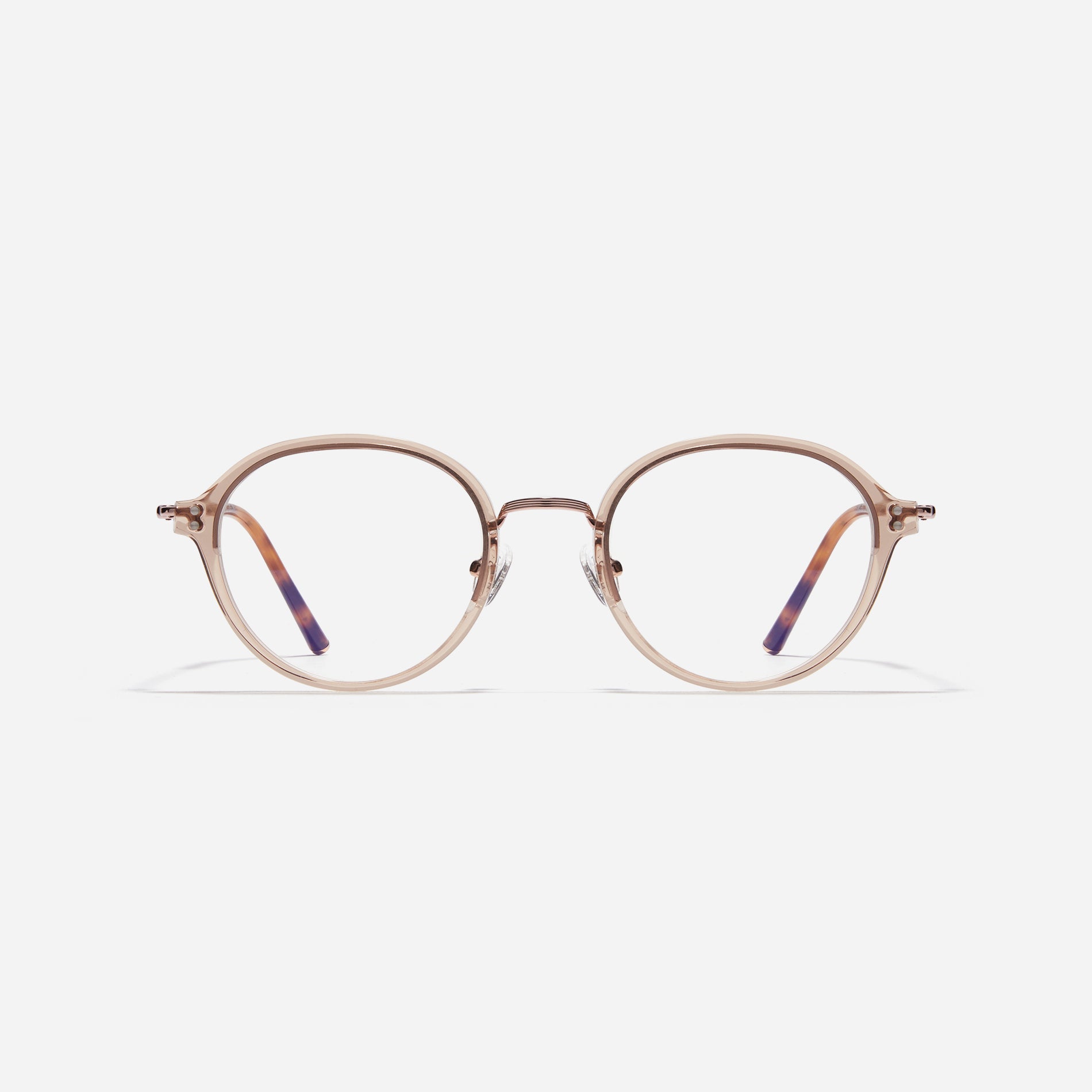 Round-shaped eyeglasses with a dual-combi structure inspired by from the aesthetics of platform shoes. Their dual-rim structure seamlessly accommodates thick lenses for higher prescriptions, while retro vibes are accentuated by side color accents.